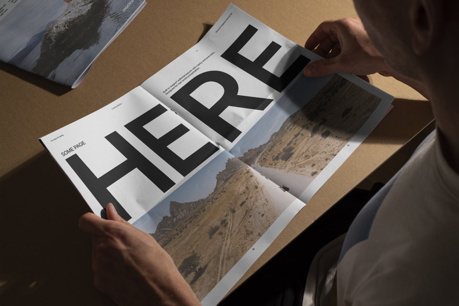 Newsprint Magazine in Hands Mockup